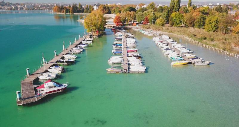 Annecy lake aerial drone boats amazing shot splendid showing the state of wild of global warming on la annecy lake aerial drone boats