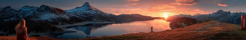 Mountains lake sunset sky reflection nature snow peak horizon clouds water grass sun distance scenery outdoors mountain range A serene landscape features a vast, calm lake reflecting the vibrant colors of a sunset. Snow-capped mountains rise majestically in the background, their peaks bathed in the warm, golden light of the setting sun. A person with long hair stands on the grassy hill, gazing at the picturesque view. The sky is a blend of orange, pink, and purple hues, creating a stunning back for the tranquil scene.